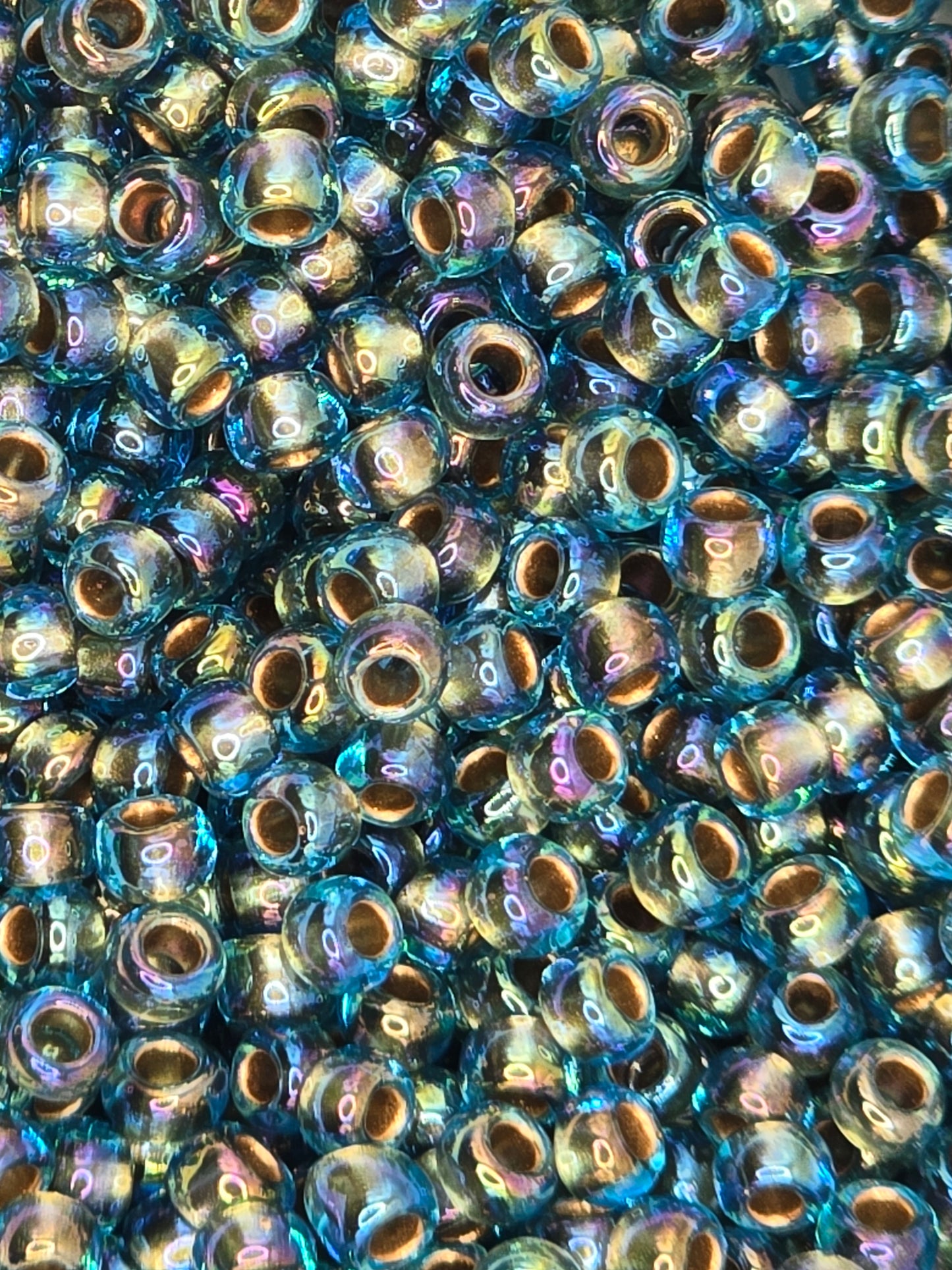 TOHO #8 Seeds - 995 - Gold Lined Rainbow Aqua - 10 gms