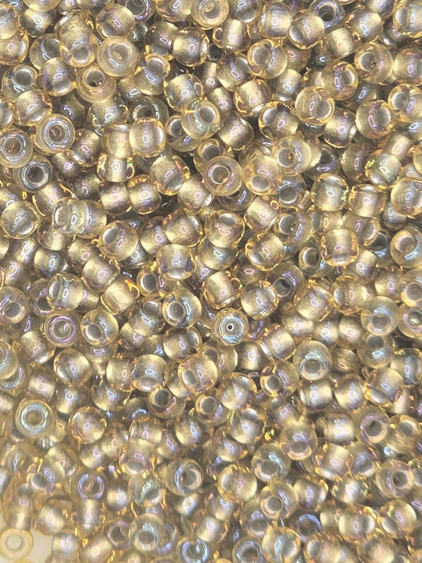 TOHO #11 Seeds - 279 - Inside Colour Rainbow Light Topaz/Grey Lined - 10 gms