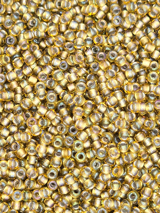 TOHO #15 Seeds - 375 - Inside Colour Rainbow Light Topaz/Grey Lined - 5 gms