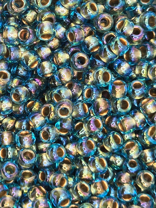 TOHO #8 Seeds - 995 - Gold Lined Rainbow Aqua - 10 gms