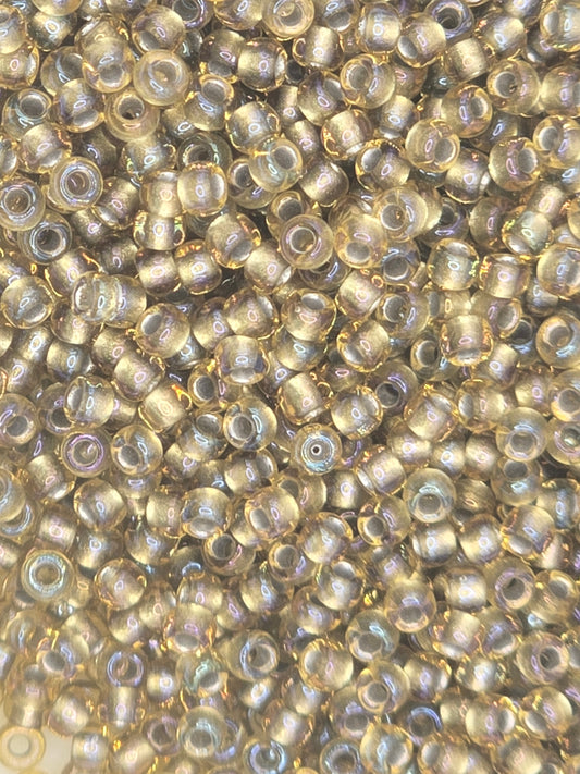 TOHO #11 Seeds - 279 - Inside Colour Rainbow Light Topaz/Grey Lined - 10 gms