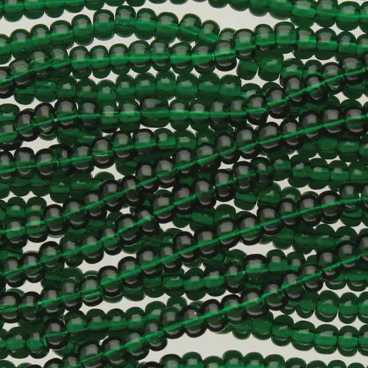 Preciosa #11 Seed Bead Hanks - Dark Green Transparent - 18 grams approx